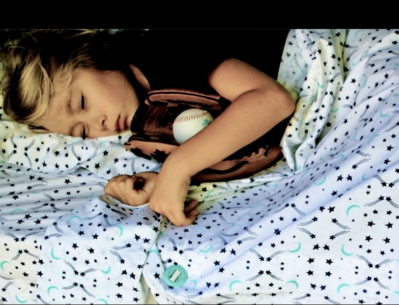 Getting Your Child to Sleep Through the Night Sheets that work Tucked + Covered