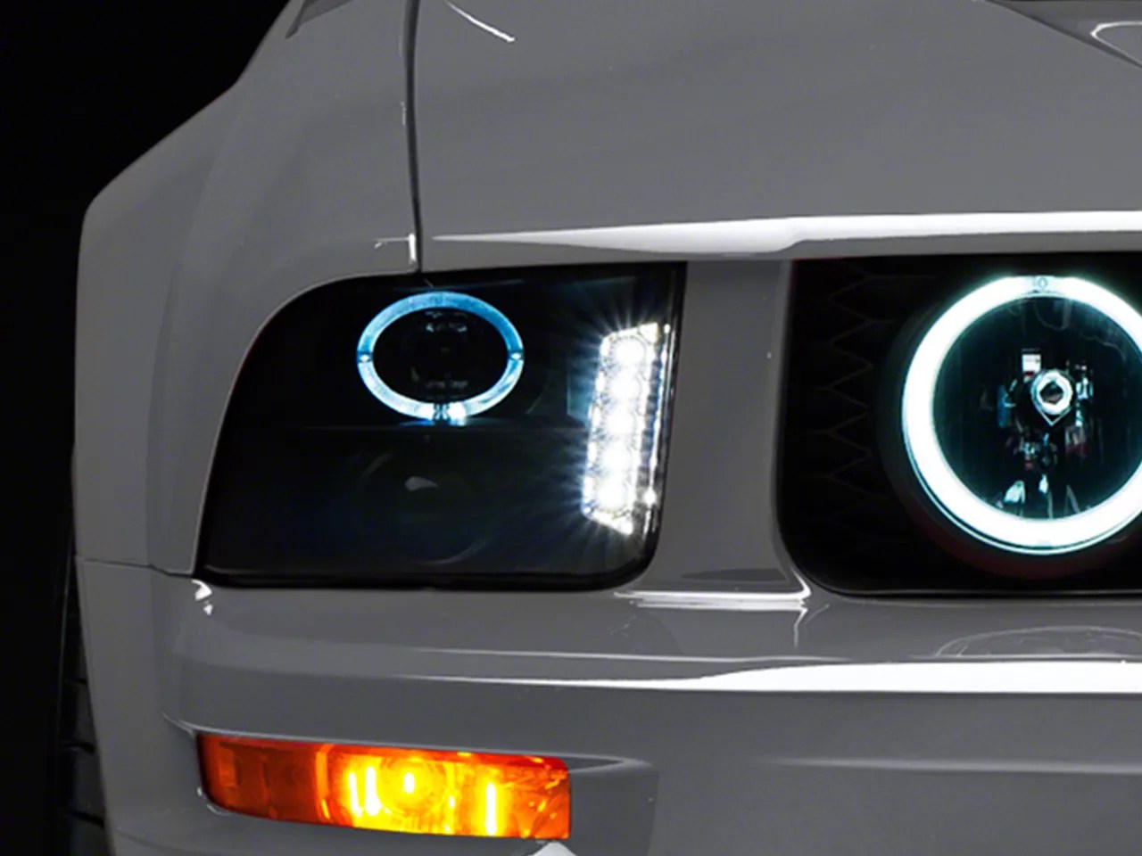 Raxiom Mustang Smoked Projector Headlights LED Halo 49128 (0509 GT, V6)