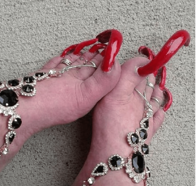 Woman's incredibly long nails earn her cash