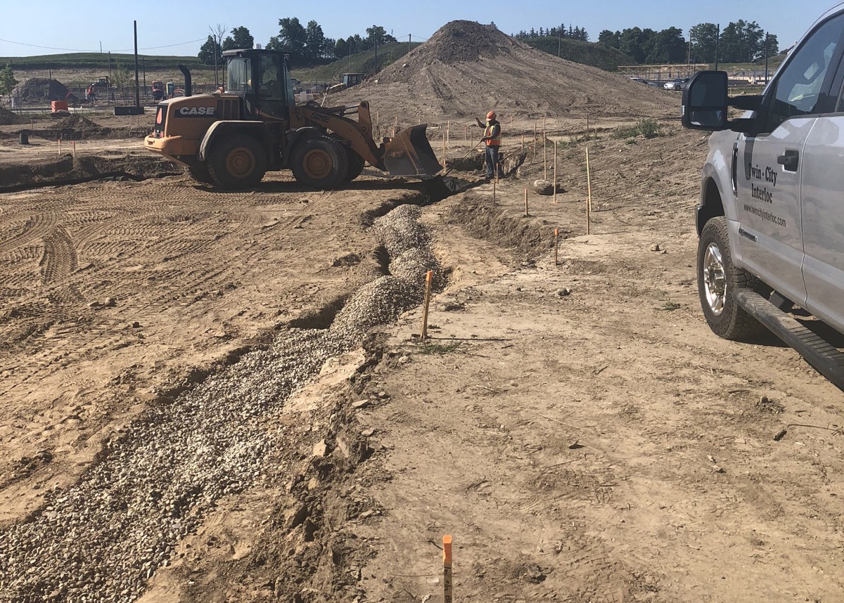 Commercial Landscape Grading & Soil Placement TwinCity Interloc