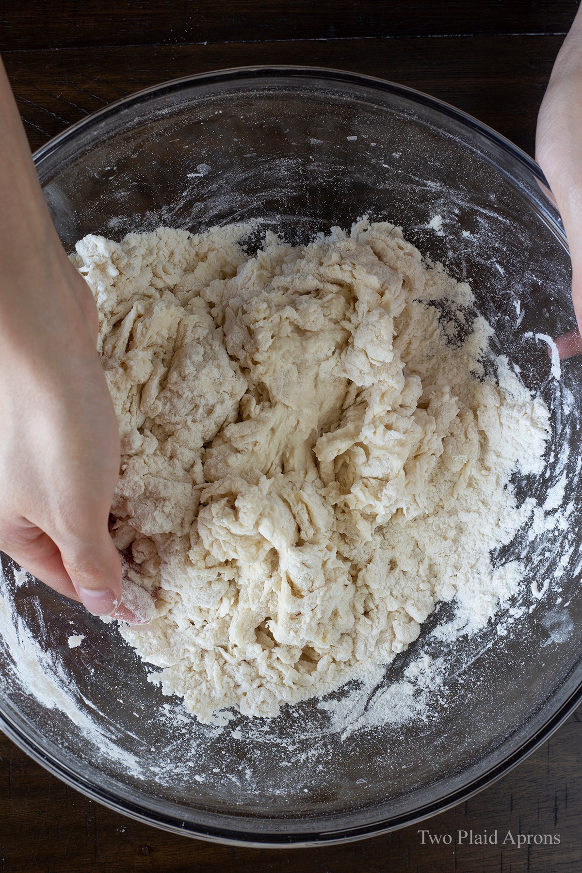 Kneading the bao bun dough after all the liquid is added.