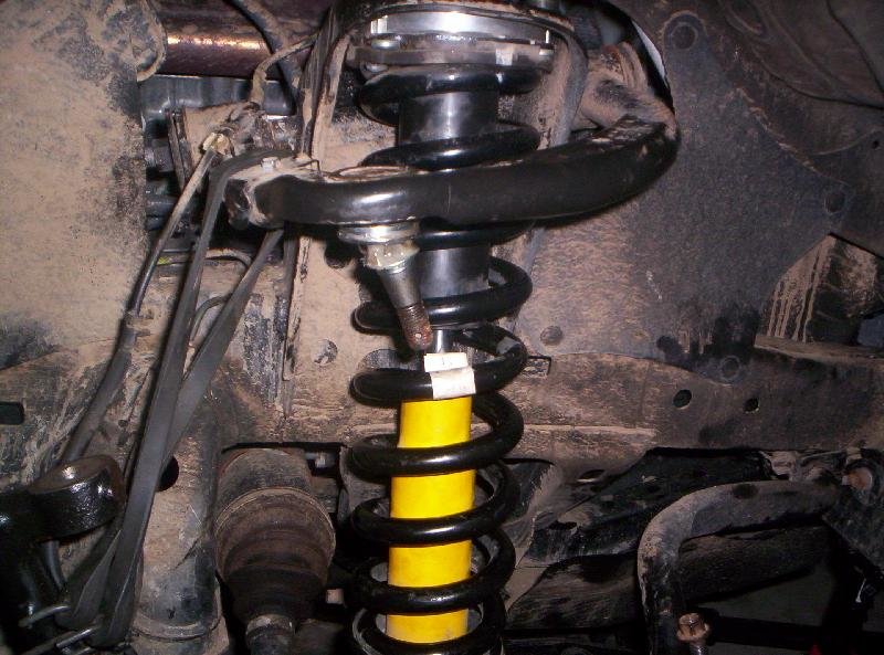 How to Front shock/spring removal Page 6 World