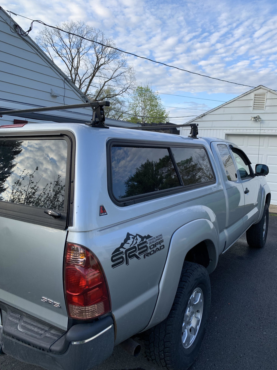 Leer Cap w/ thule rack and ARB awning World