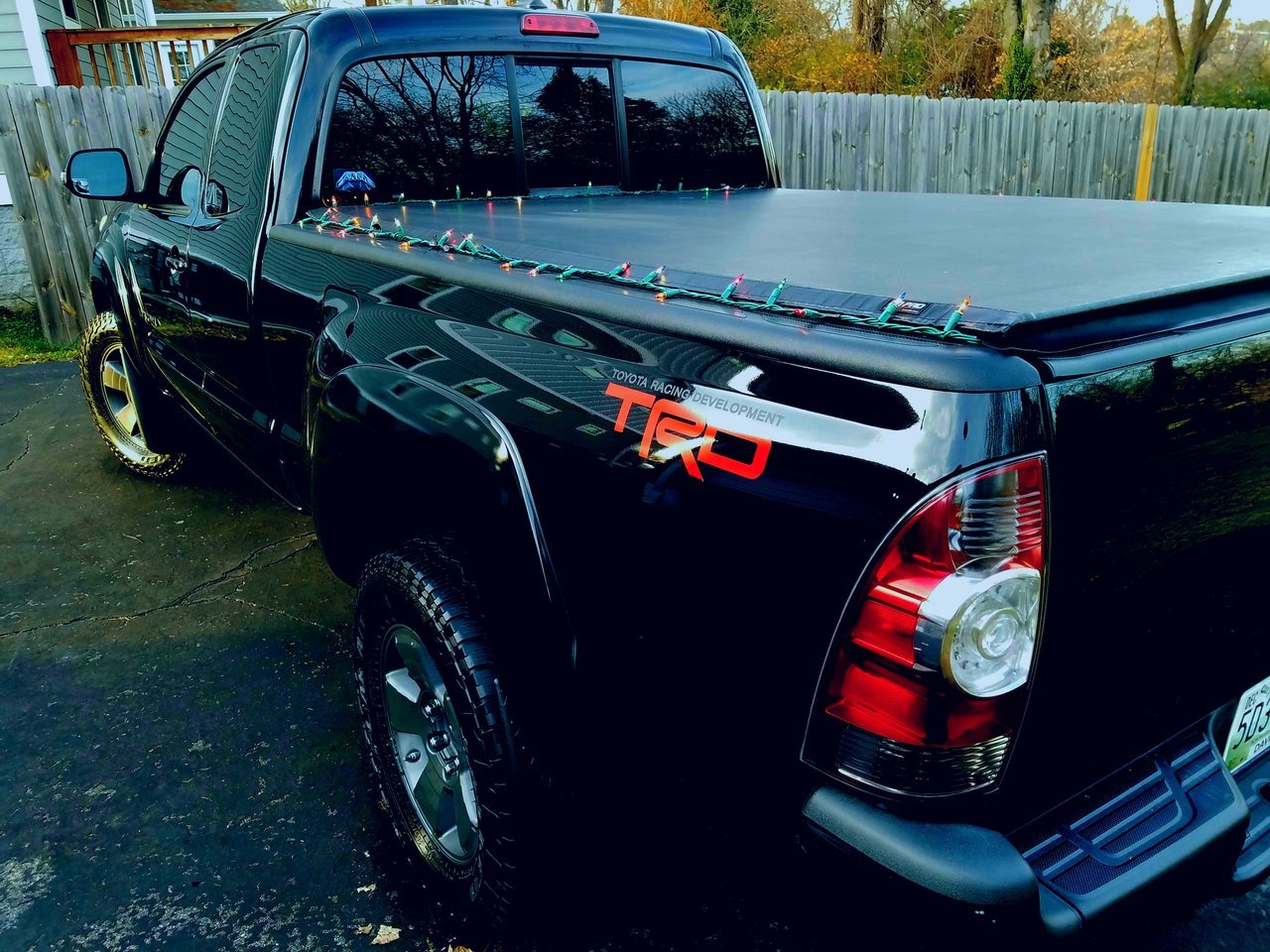 How can I attach Christmas lights to my truck without damaging the