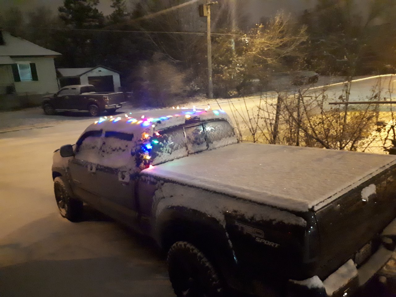 How can I attach Christmas lights to my truck without damaging the