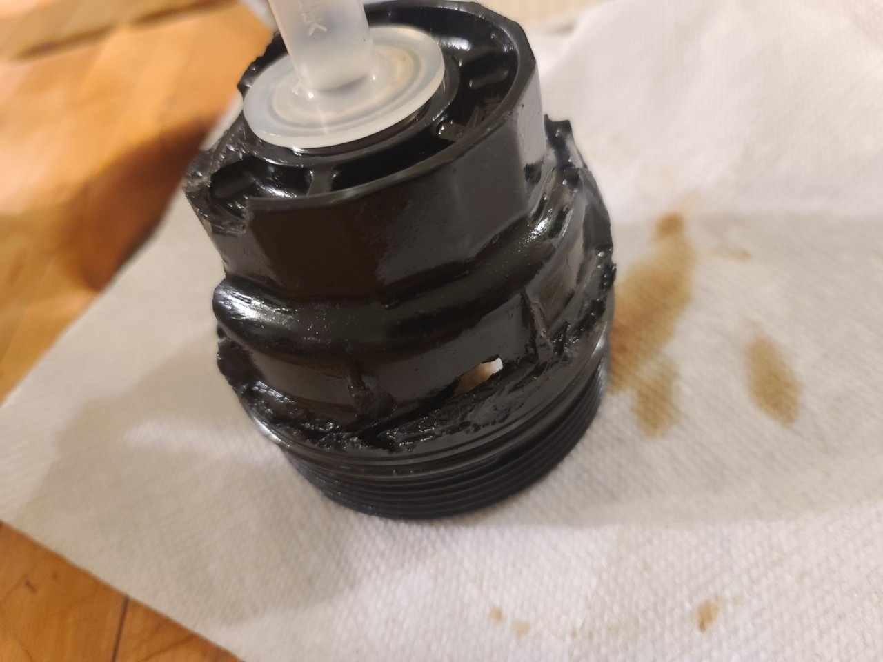 Frozen and mangled oil filtter cap World