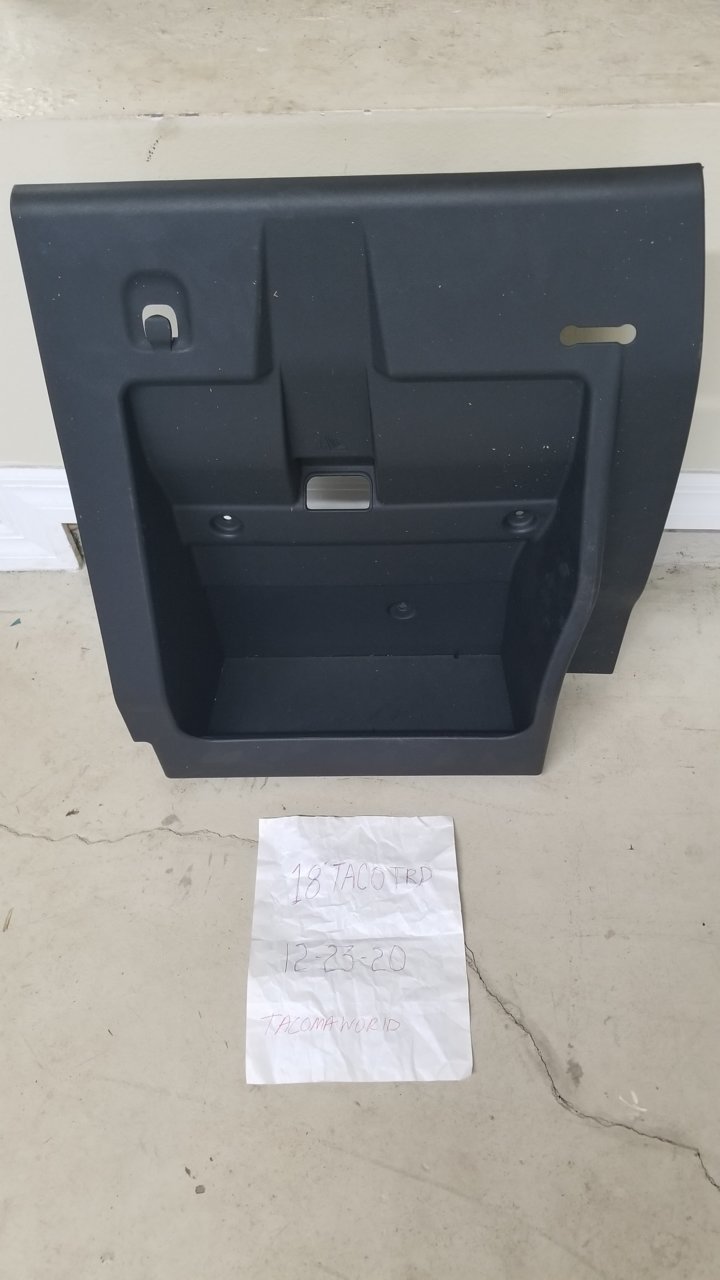 SOLD Rear seat storage compartment World