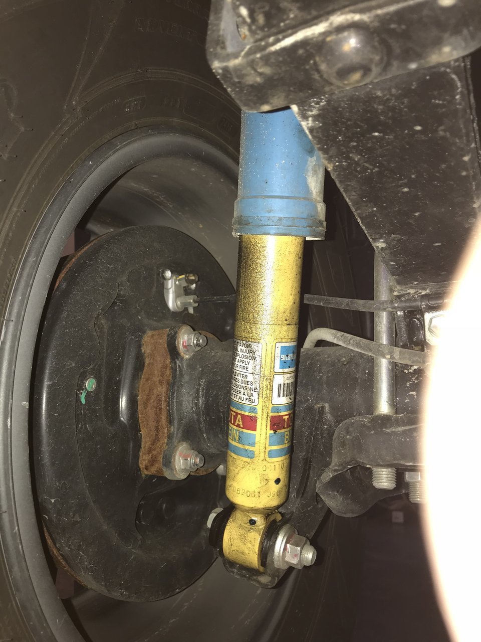 A lot of grease coming out of my rear left shock World