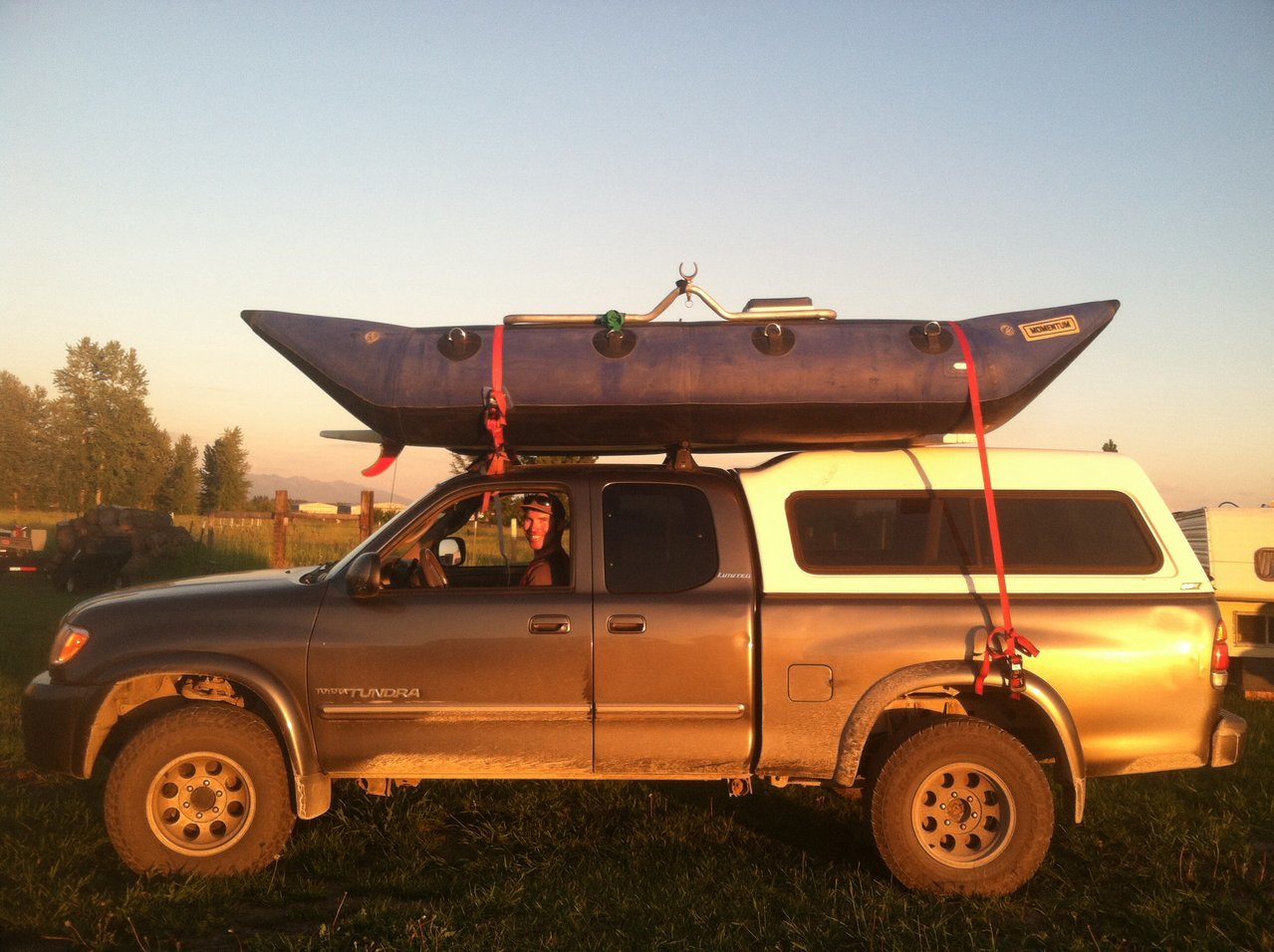 Carrying an Inflatable Boat on the Roof World