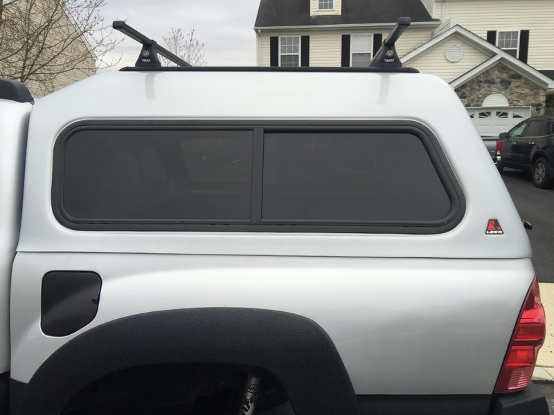 Silver Leer Cap 180 XR with Thule rack for sale 1250 World