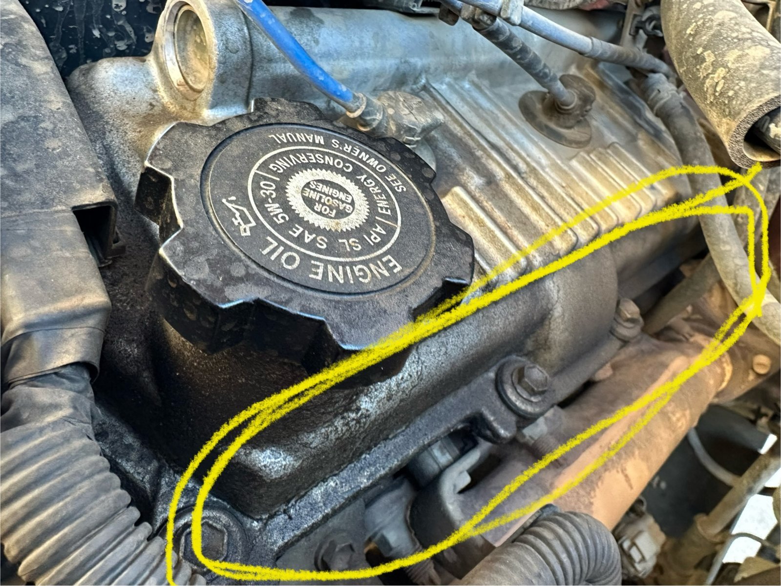 Possible valve cover/head gasket leak World