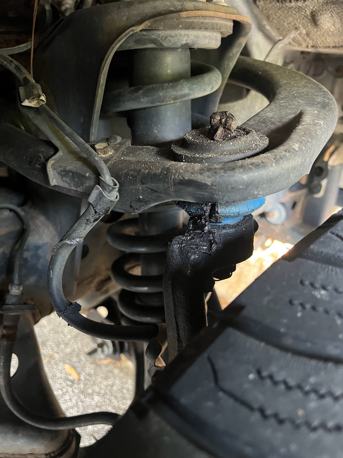 Appears to be grease leakage on front shock World