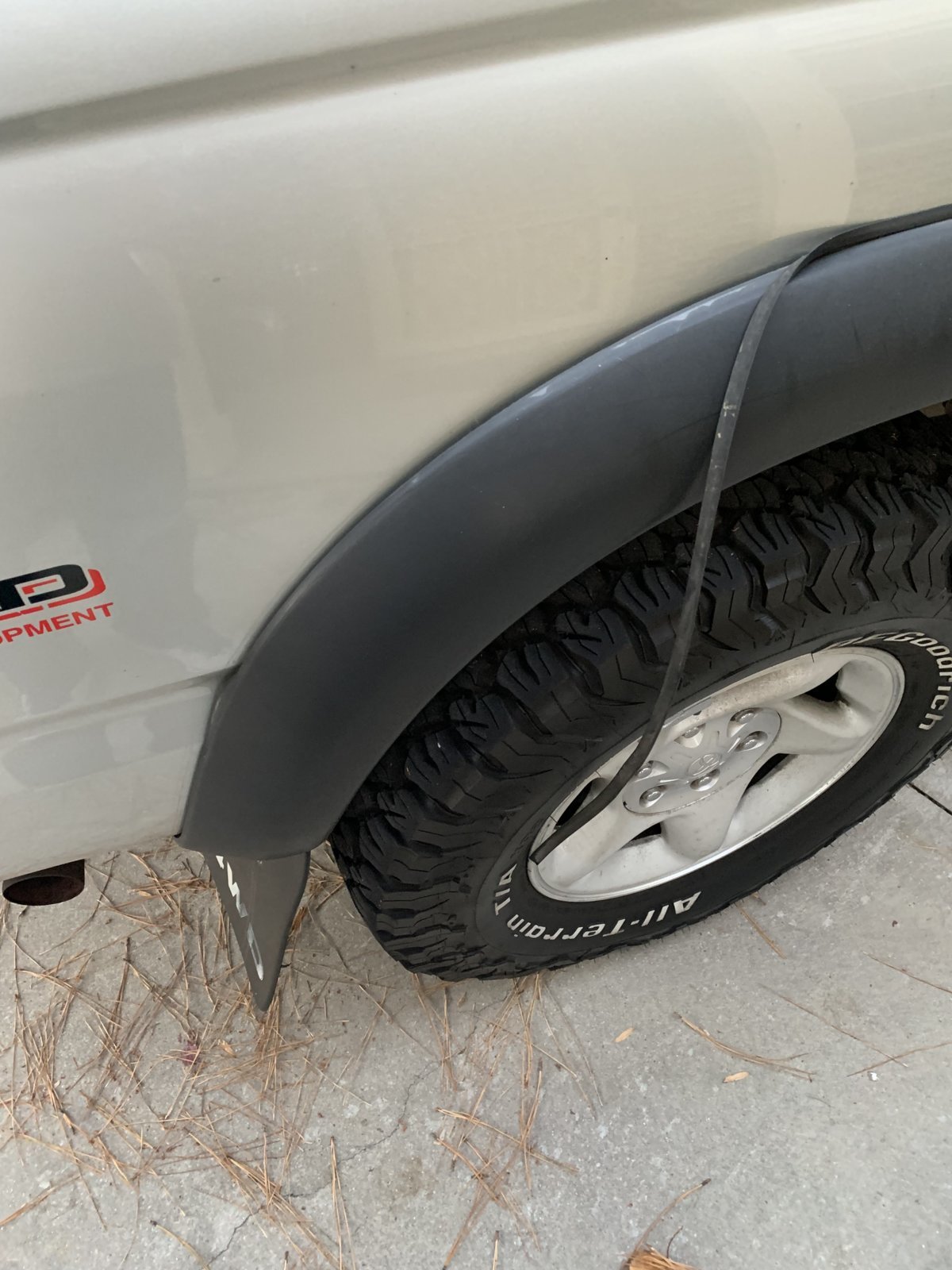 Help with loose fender flare trim World