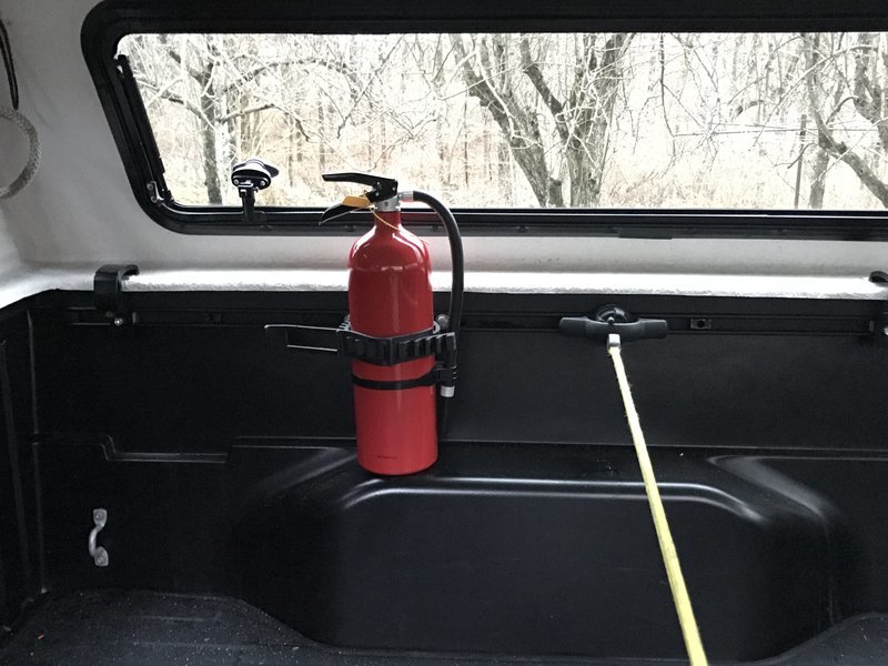 How are you folks mounting fire extinguishers? World