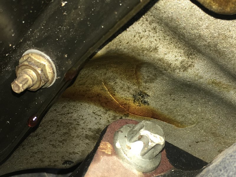 I done goofed. Cracked upper oil pan. World