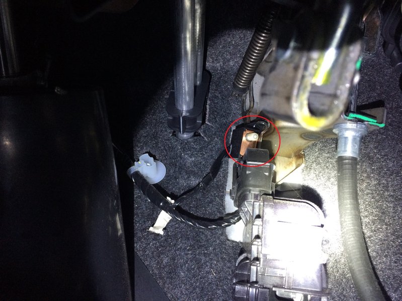 What is this button/switch behind my gas pedal? (2015 Manual)