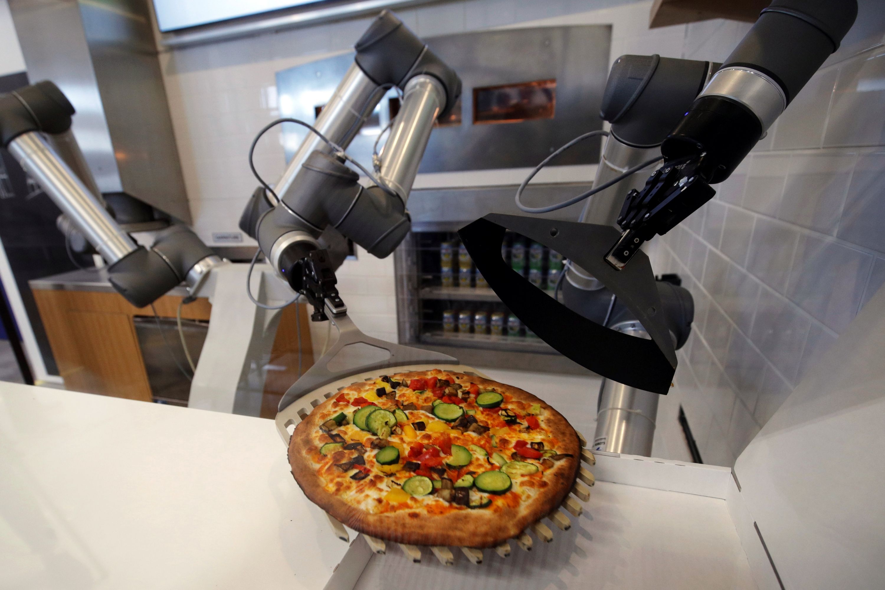 Los robots cocineros ganan terreno pizzas, hamburguesas y hasta cocina