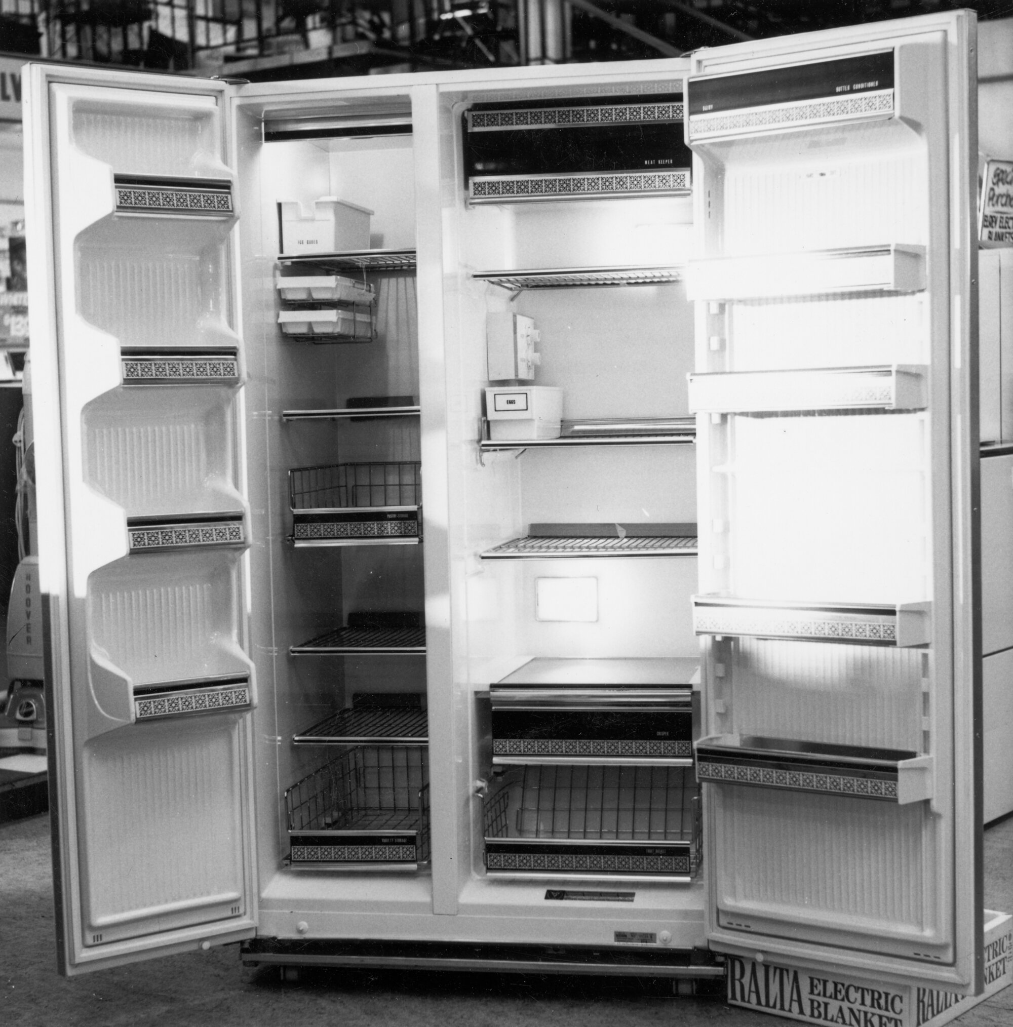 Hazelwoods; open fridgefreezer showing capacity and shelves. [P2480