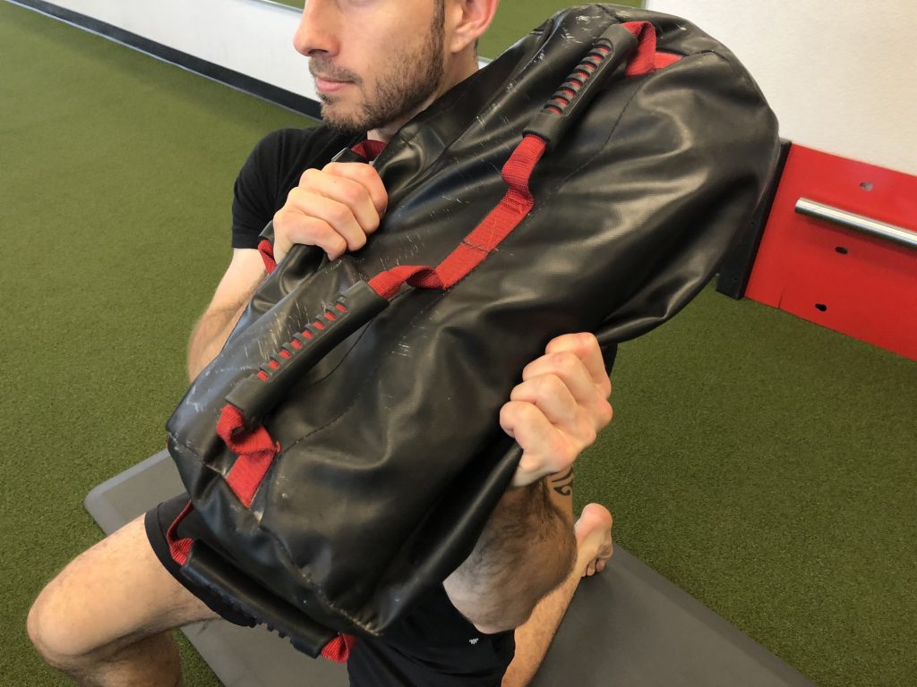 How Core Strength Makes Us Stronger & More Mobile Ultimate Sandbag