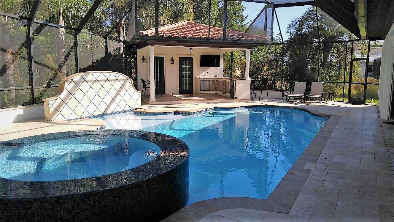 Negative Edge Spa + Water Feature + Kitchen Ultra Custom Pool Design