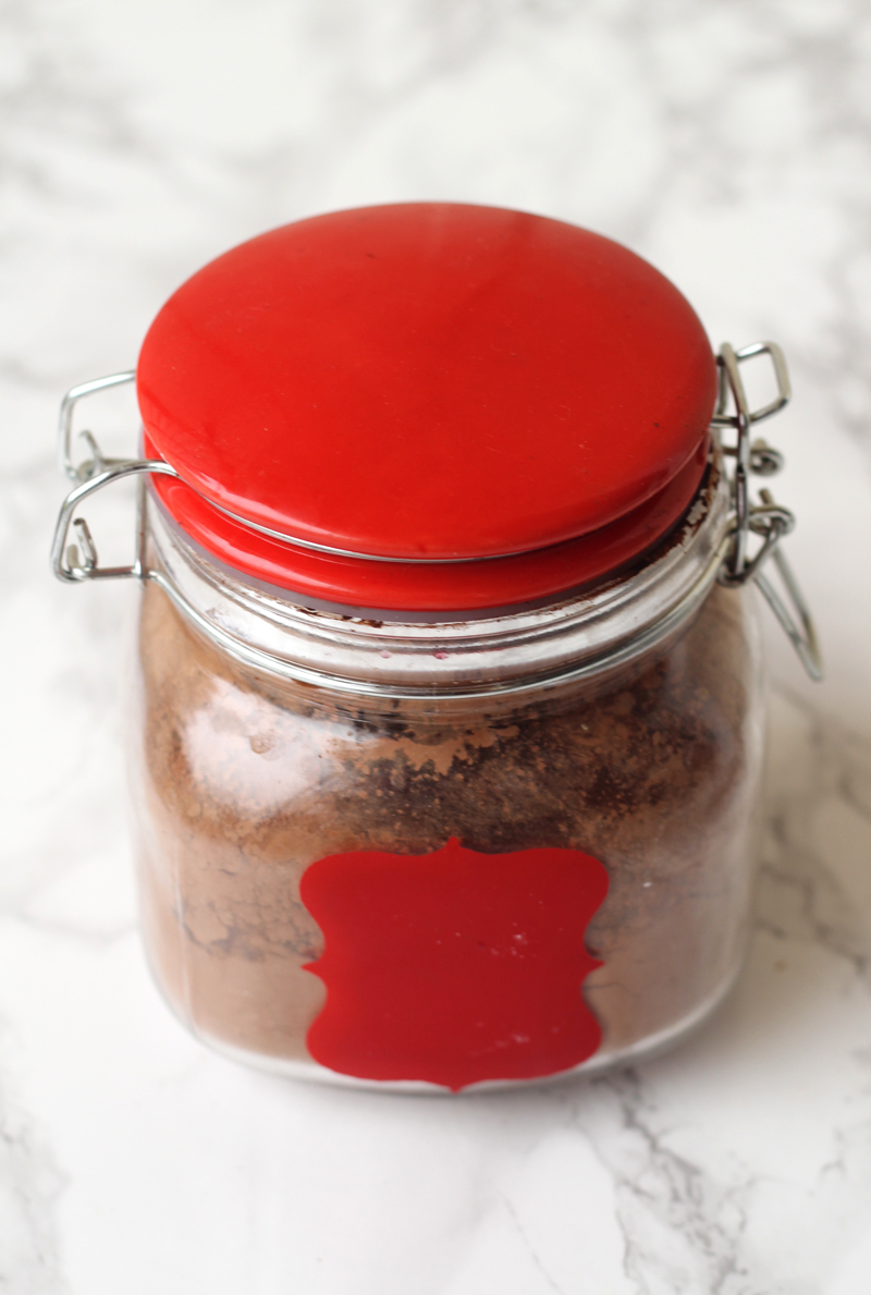 Hot chocolate in a white and red canister.