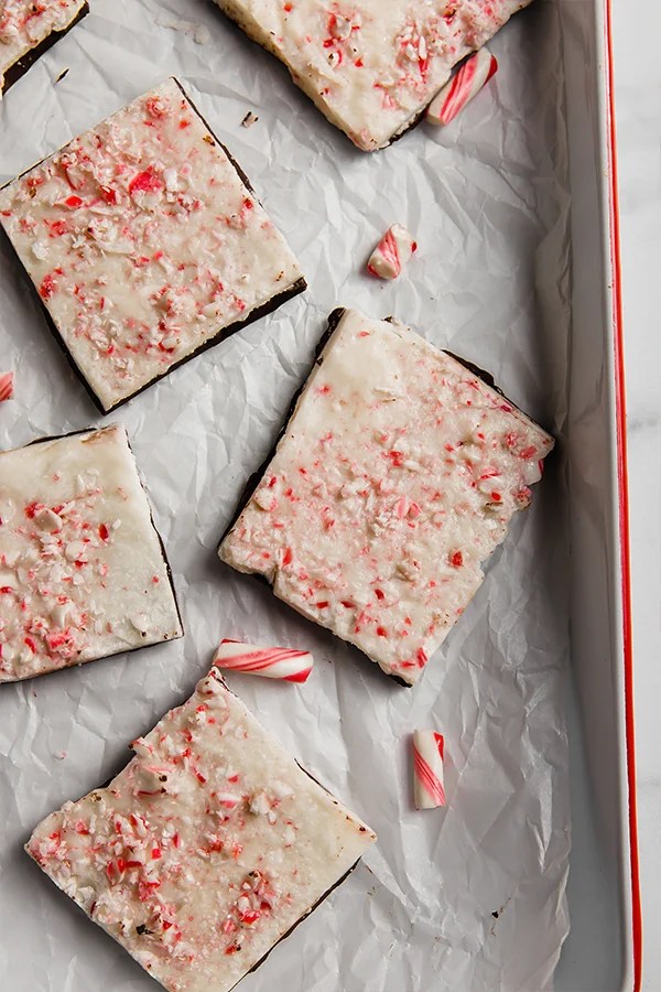 Peppermint bark in a lined baking dish.