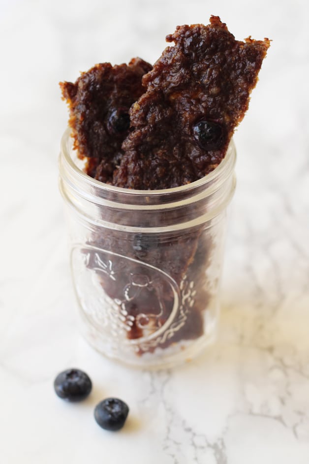 A class jar filled with beef jerky.