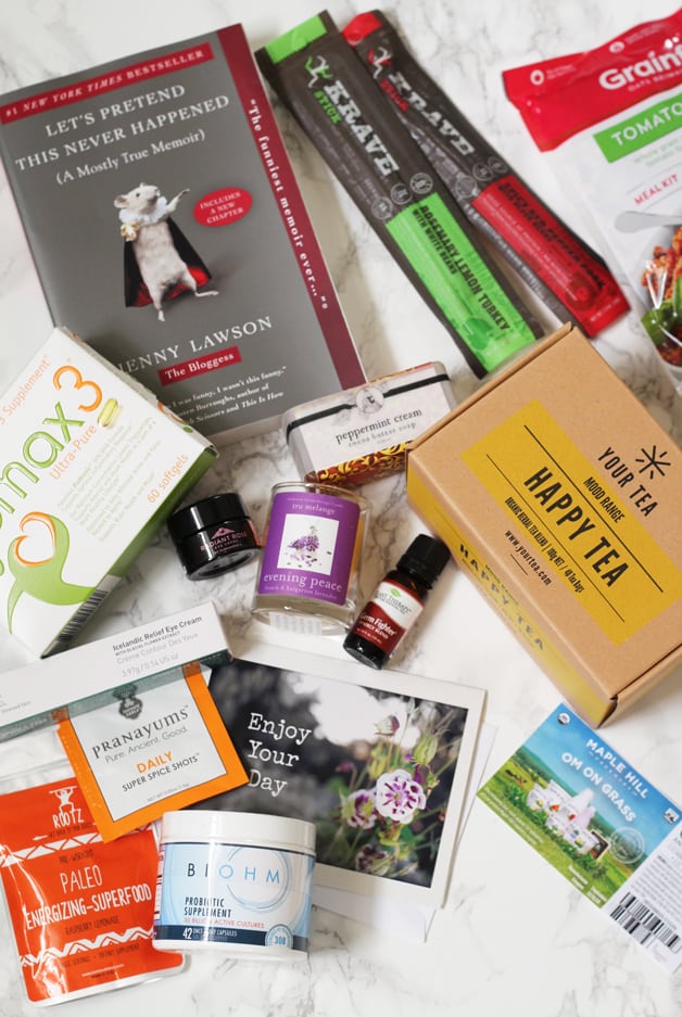 A collection of items from Spring Mantra Box open on a counter.