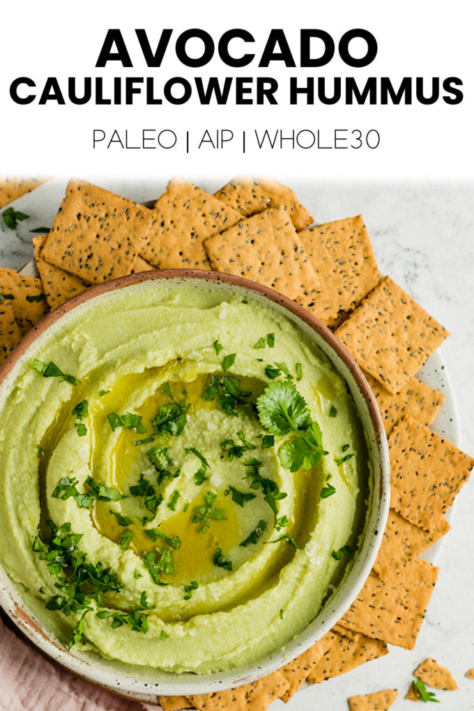 Hummus with text \"Avocado cauliflower hummus Paleo | AIP | Whole30.\"