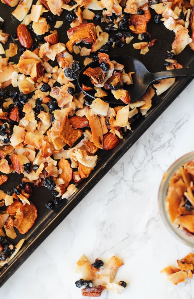 A sheet pan with homemade granola on it after baking.