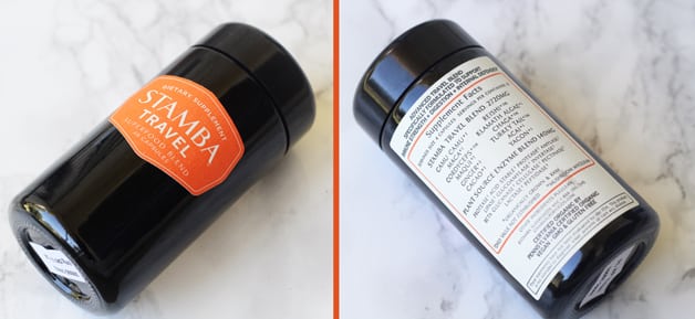 A bottle of travel blend with photos of the front and back.