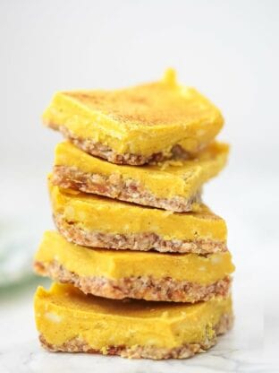 A stack of five turmeric bars stacked on top of each other.