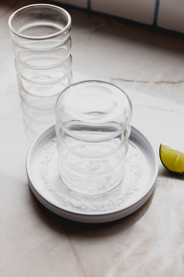 Glass upside-down in a dish of salt.