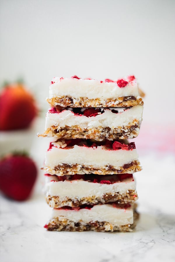 A stack of five strawberry shortcake bars on top of each other.