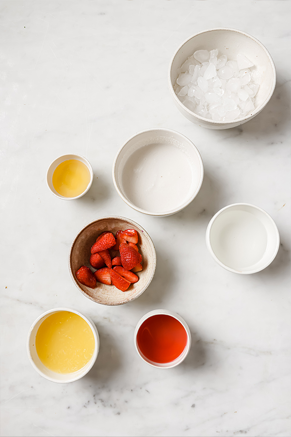 Ingredients including coconut cream, lemon juice, and cranberry juice.