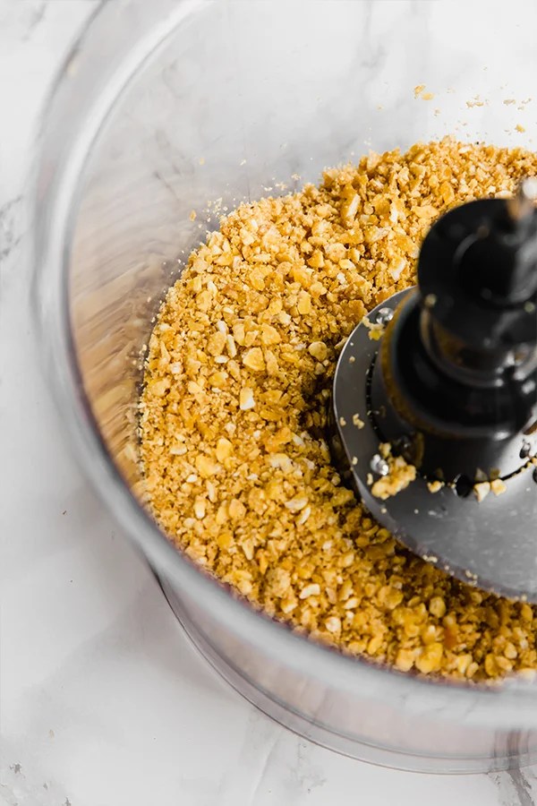 A food processor making the onion ring coating.