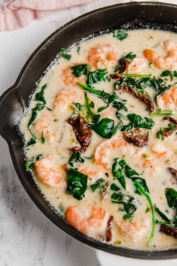 tuscan garlic shrimp in cast iron skillet