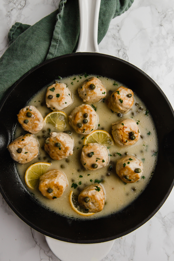 chicken piccata meatballs in skillet