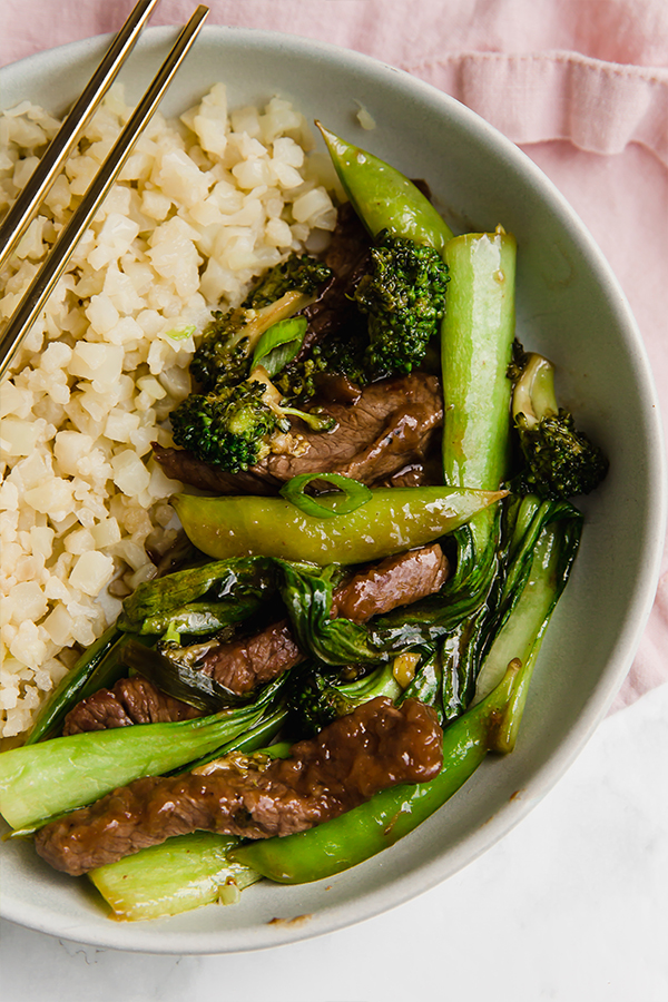 Stir fry in bowl with cauliflower rice