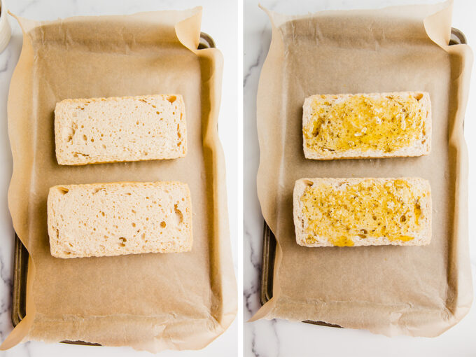 A baking sheet covered in parchment paper with slices of sourdough before and after adding garlic spread to it.