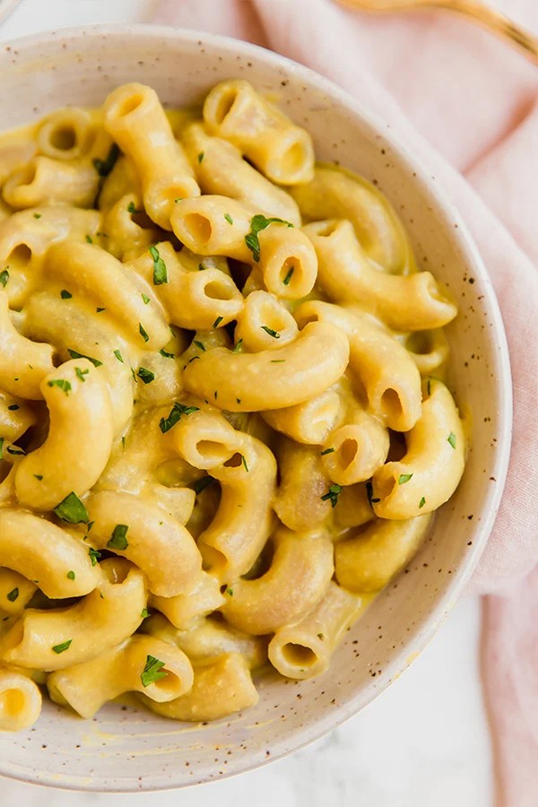 A white bowl filled with AIP mac and cheese.