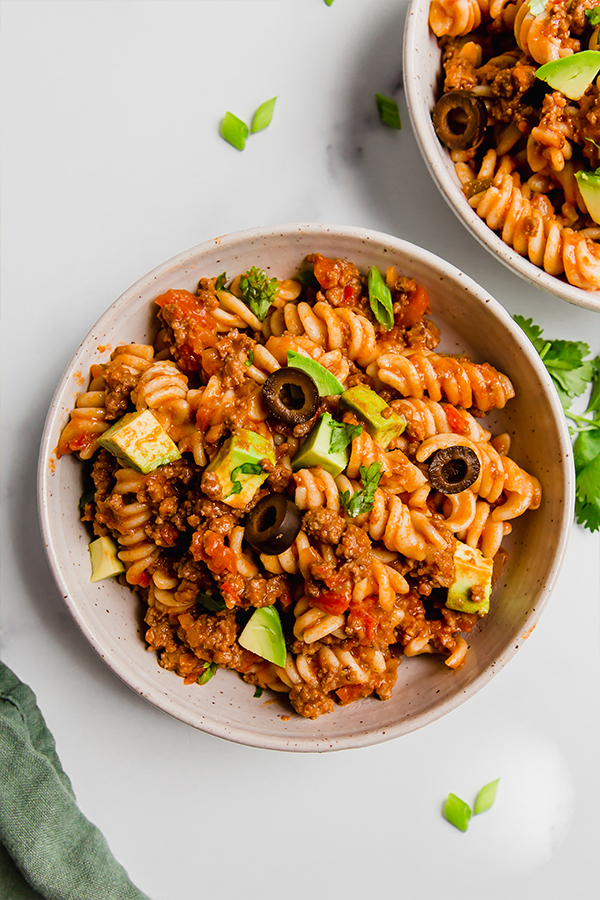 A white bowl filled with paleo taco pasta.