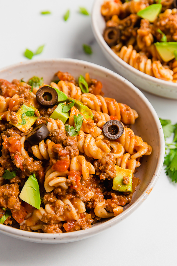 A white bowl filled with paleo taco pasta.