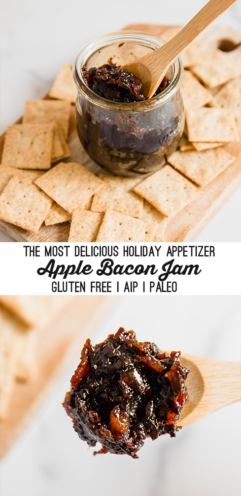 A wooden board filled with crackers and a glass jar with apple bacon jam and a wooden spoon in the jar of jam with text reading \"the most delicious holiday appetizer apple bacon jam gluten free aip paleo\"