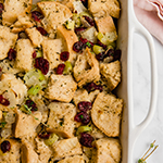 A white baking pan with gluten free stuffing after baking.