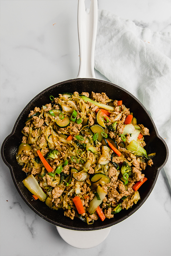 ground turkey and vegetable teriyaki stir fry in cast iron skillet