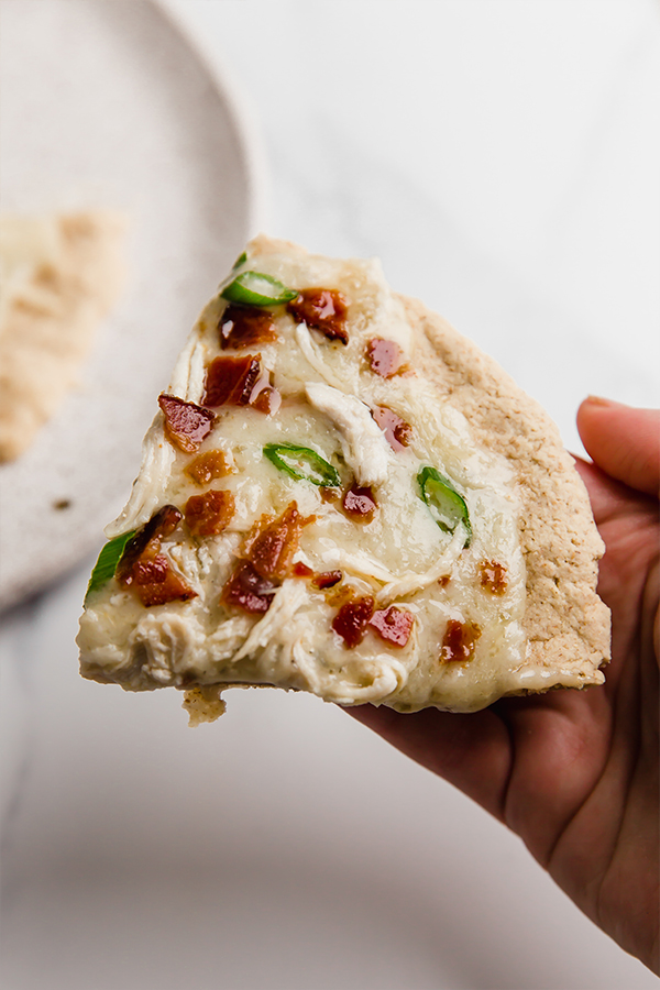 pizza slice in hands