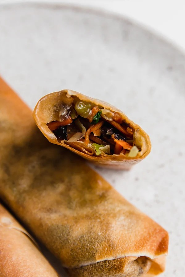 air fryer egg rolls open with filling showing