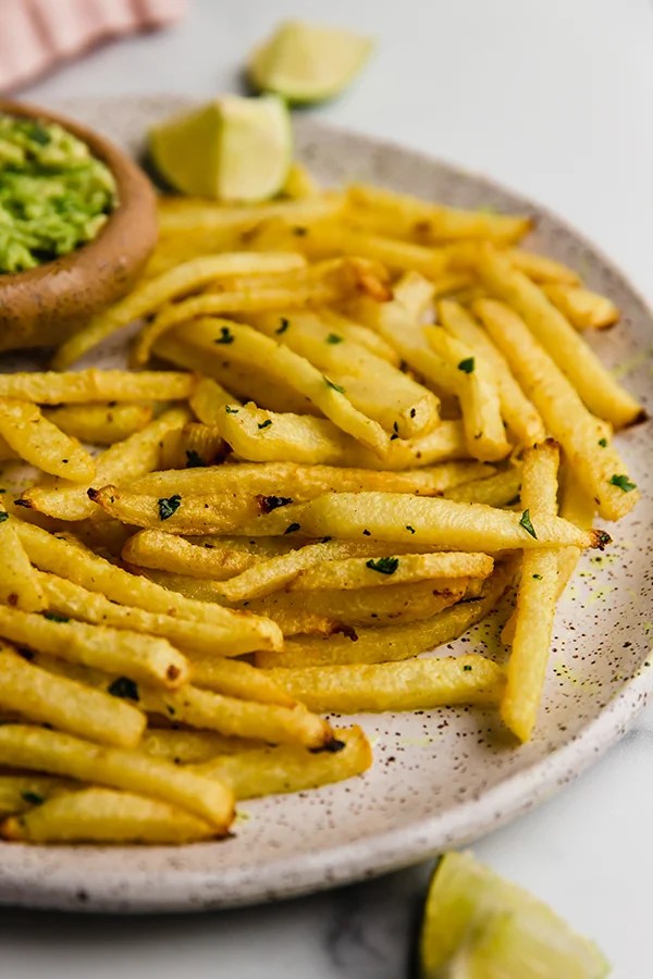jicama fries on plate with guacamole