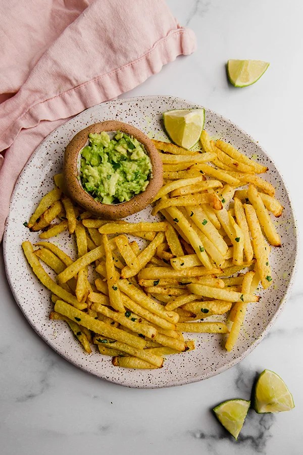 jicama fries on plate with guacamole